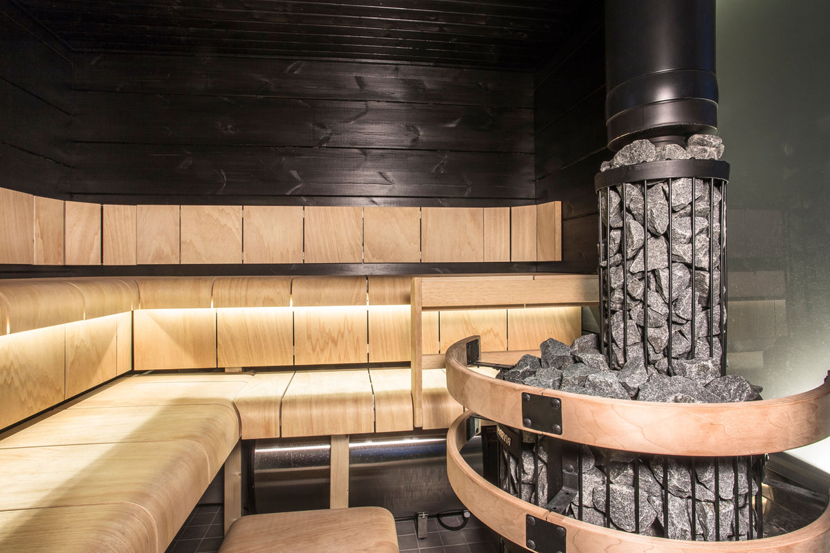 Harvia Legend wood-burning sauna heater in a sauna room