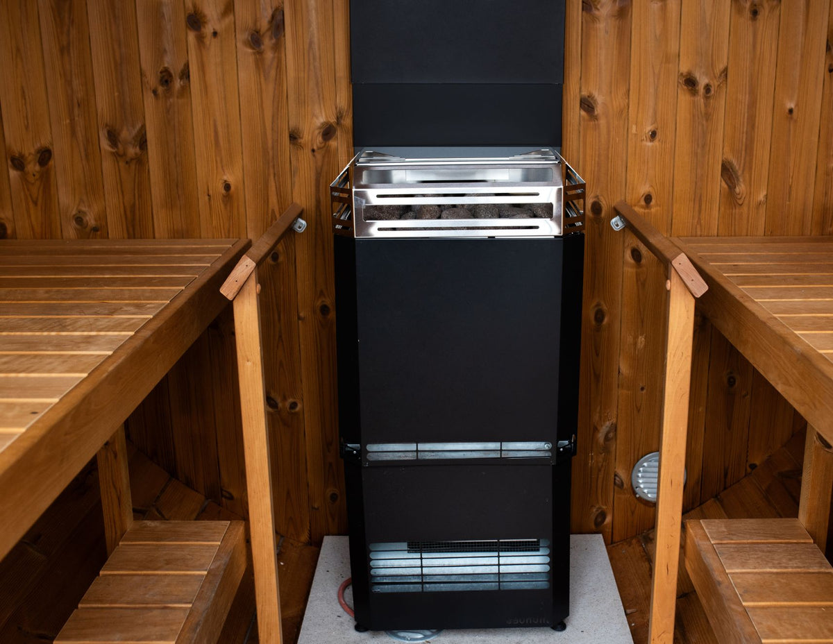 Saunum Air L 15 sauna heater installed in a sauna