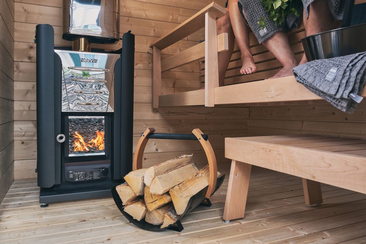 Harvia Pro 20 stove with water heater, sheath, and bedding