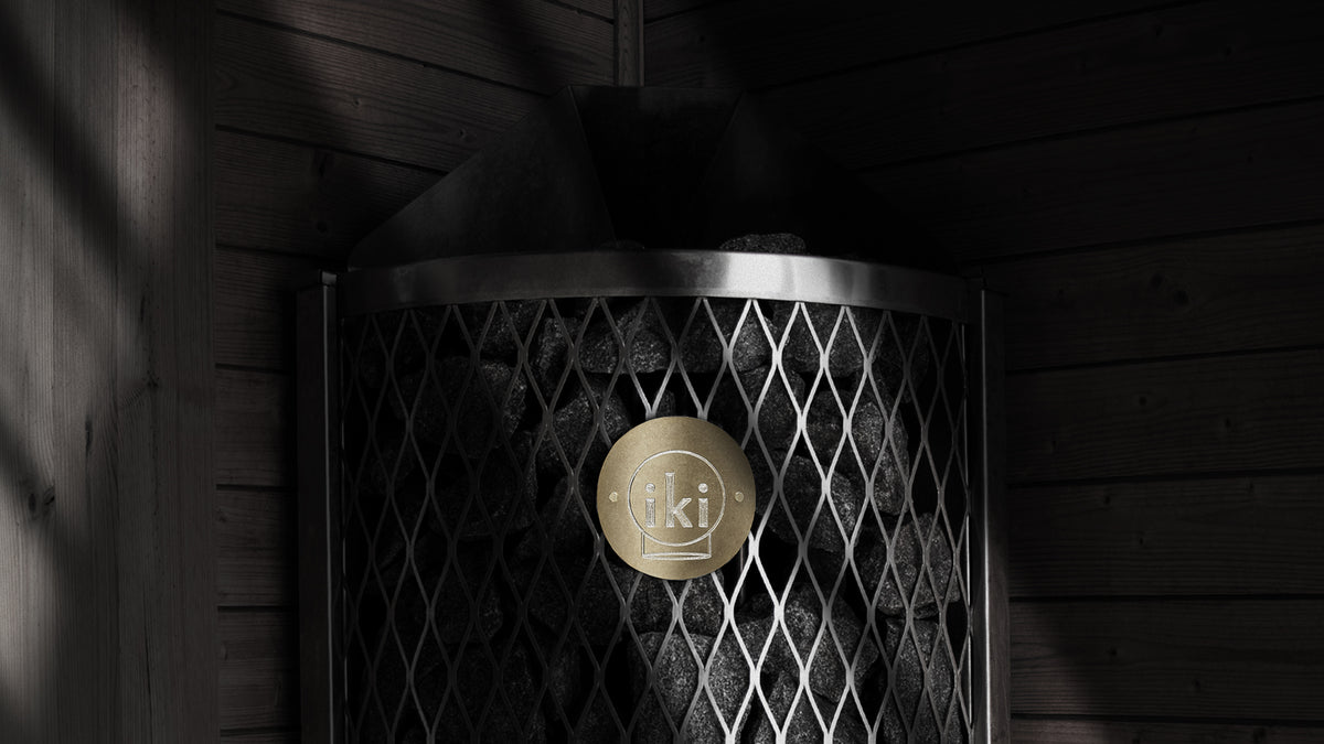 IKI Corner 6 kW sauna heater in a sauna interior