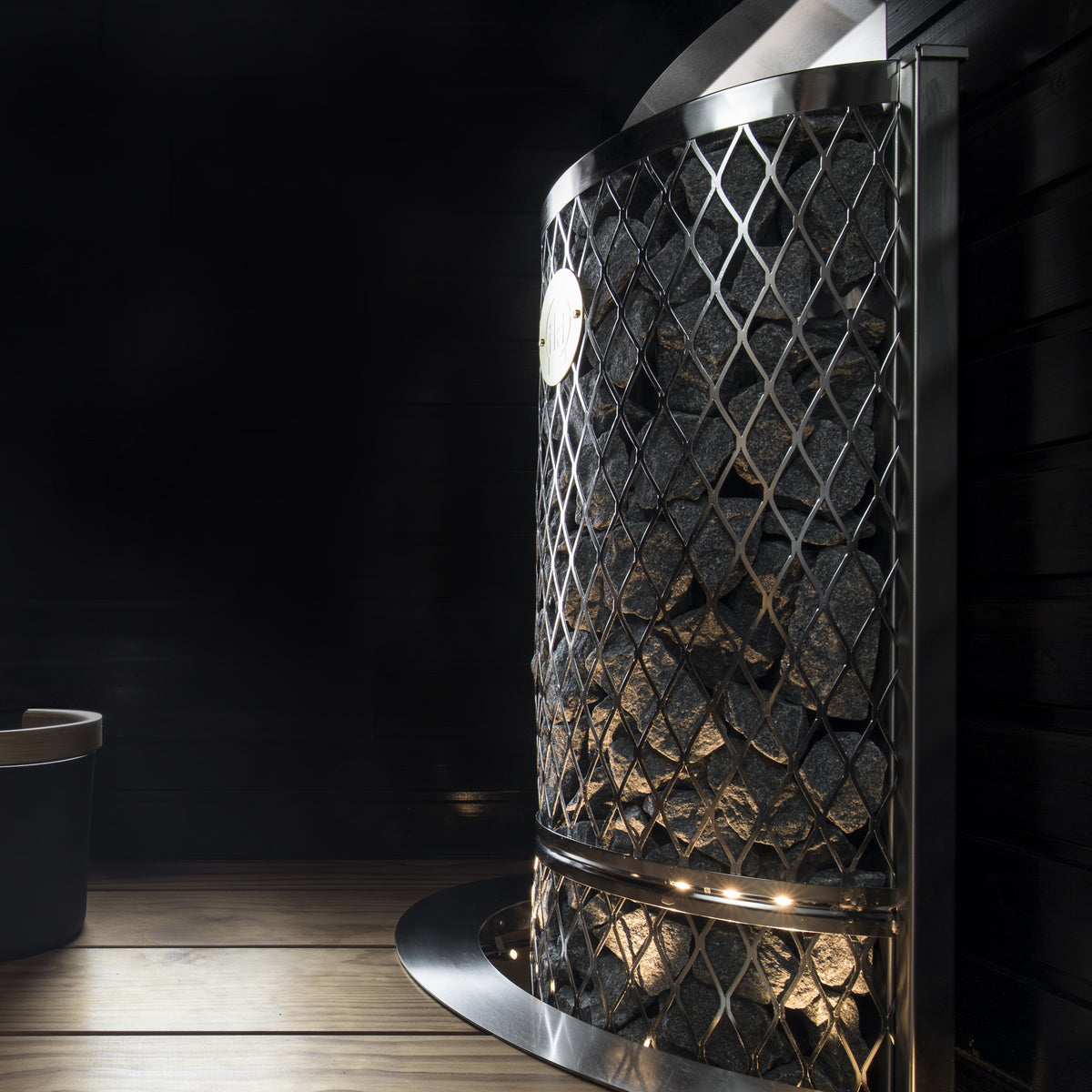 IKI Wall 6 kW sauna heater mounted in a cedar sauna room